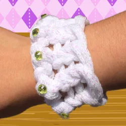 Armbandje met plaksteentjes breien op een loombord