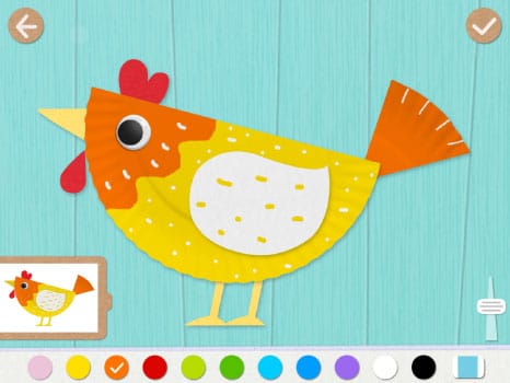 Kind knipt en plakt in Papieren bord app op een tablet