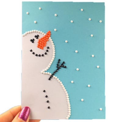 Kerstkaart knutselen met diamond painting steentjes die je over hebt